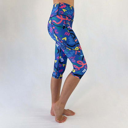 Side view of Art2Go 3/4 length leggings with pocket in Barcelona design