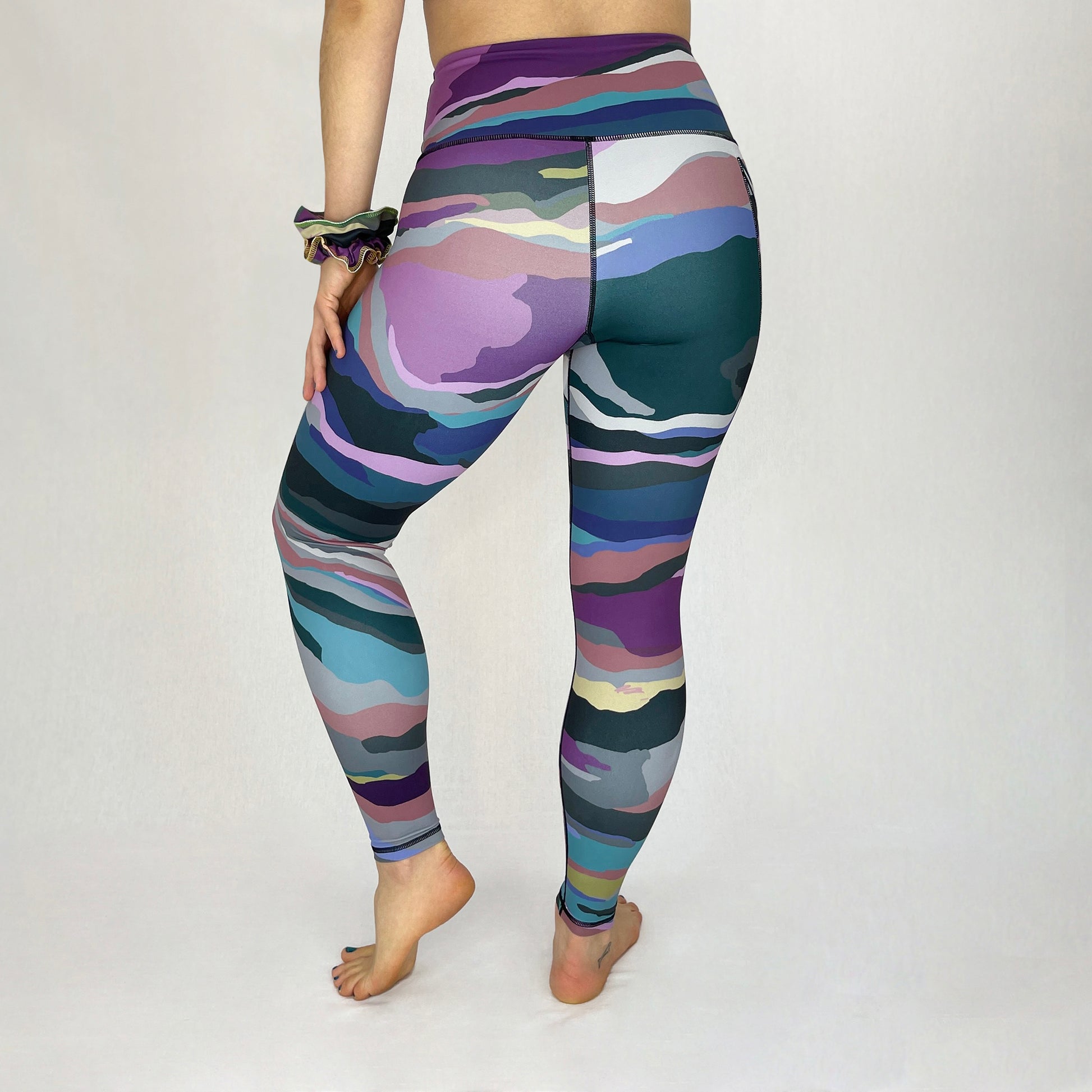 colourful high rise leggings with pockets made sustainably from recycled materials - purple camouflage back