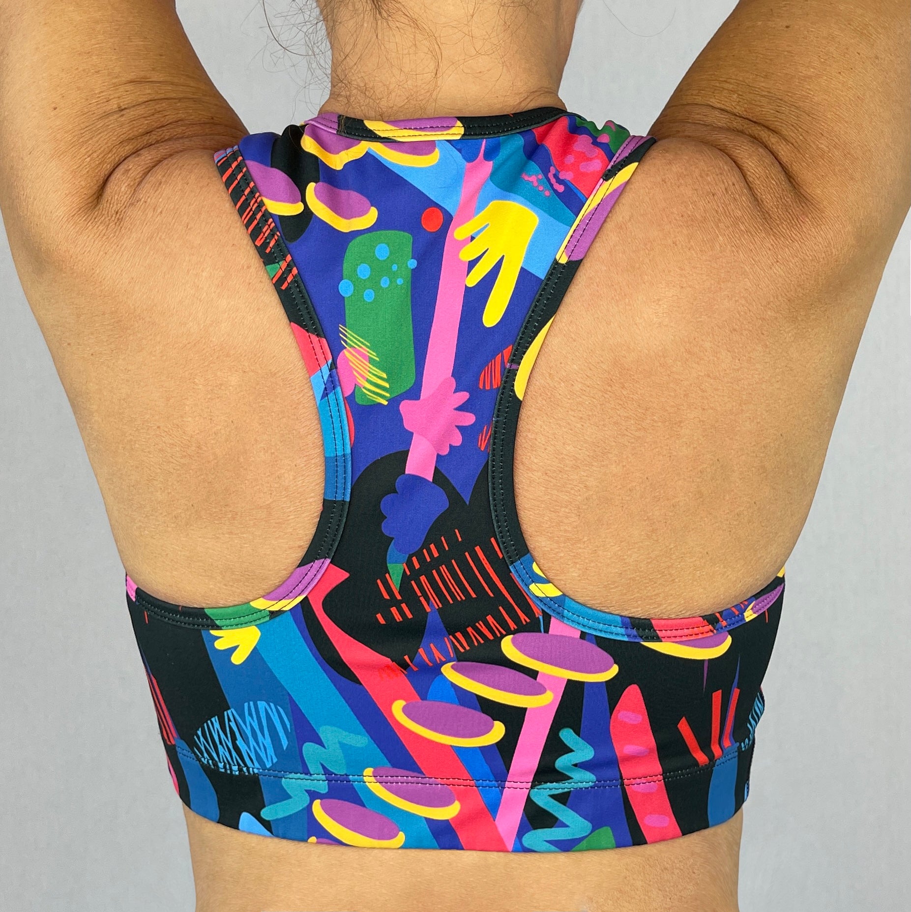 colourful sports bra made sustainably from recycled materials - Olympia - back