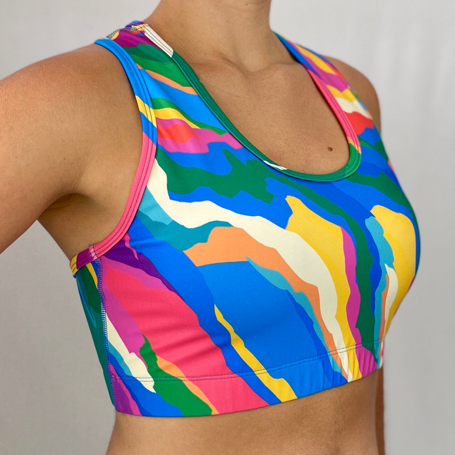 Rainbow sports bra by Monique Baqués side