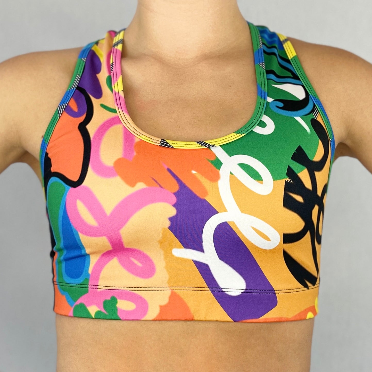 colourful sports bra made sustainably from recycled materials - Venus - front