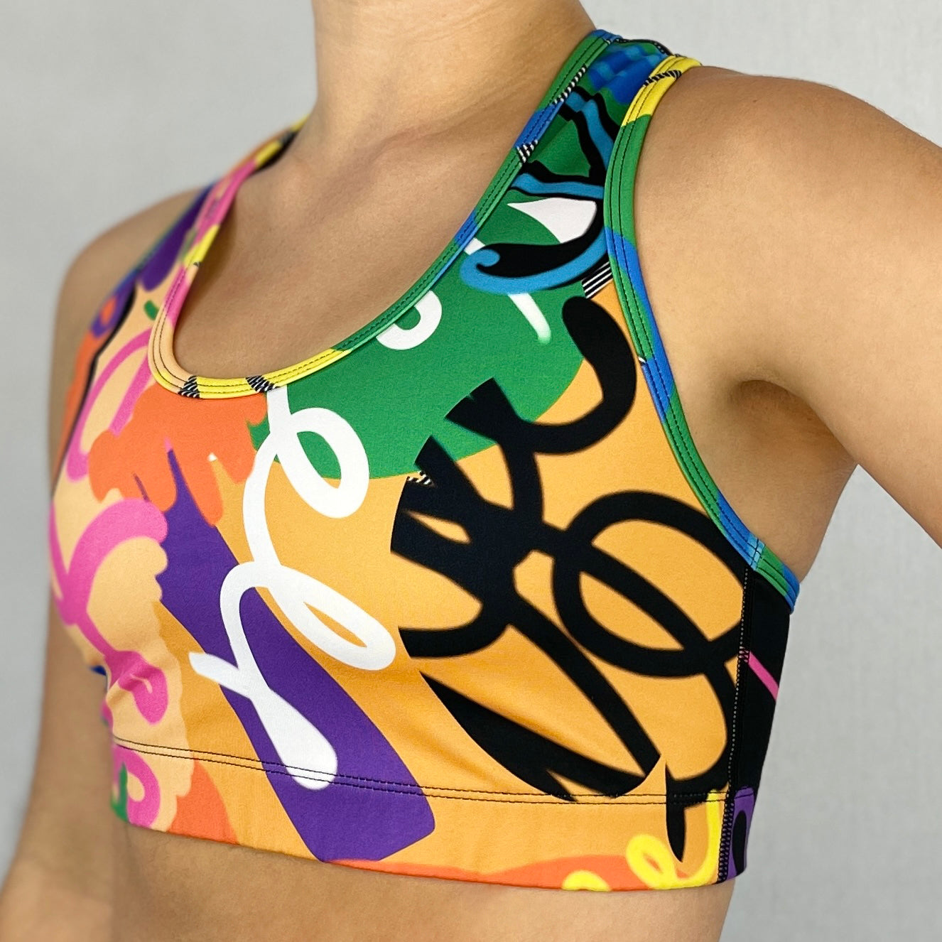colourful sports bra made sustainably from recycled materials - Venus - side