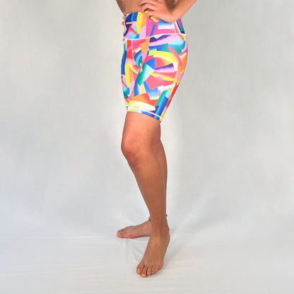 Side view of colourful bike shorts with pocket in Festive design by Art2Go Monique Baques