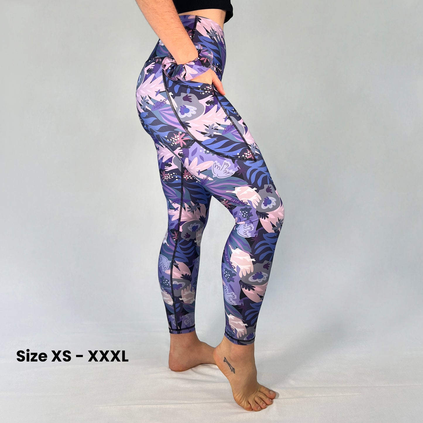 Side view of full-length leggings with pocket in Paloma design by Art2Go Monique Baques