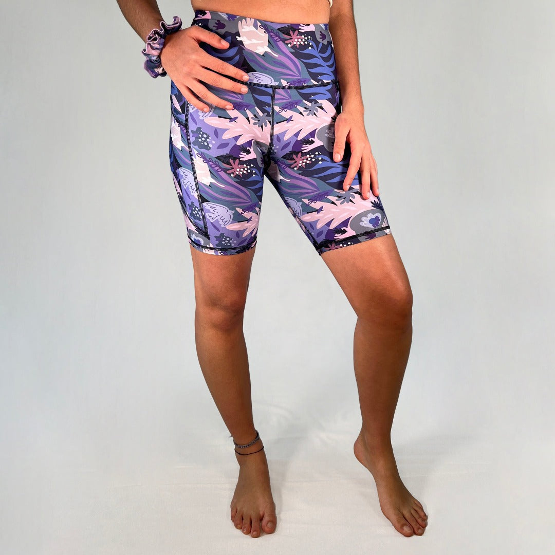 Front view of bike shorts with pocket in Paloma design by Art2Go Monique Baques